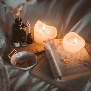 night routine-candles-bed-reading-min