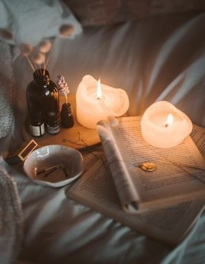 night routine-candles-bed-reading-min