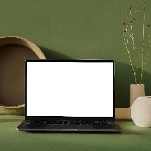 writing productivity - green laptop-min